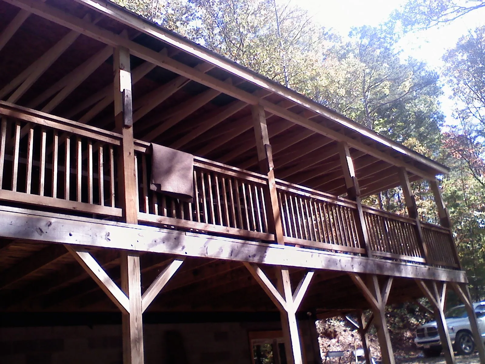 Timber framing under a new elevated porch and deck — Roof Leak Repair in Nekoma by Roofing Brothers